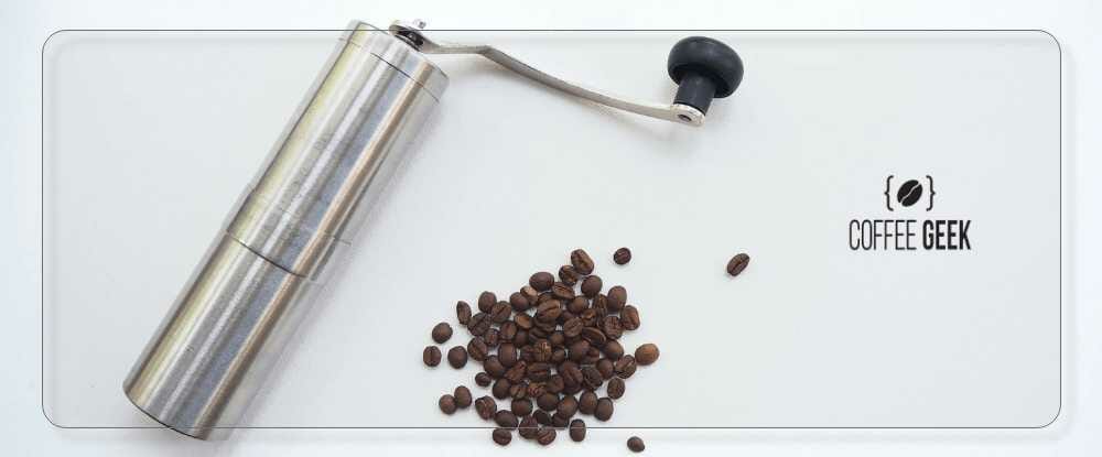 Hand coffee grinder with coffee beans