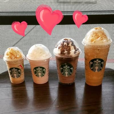 Different Starbucks cup sizes - Short, Tall, Grande, and Venti from left to right 