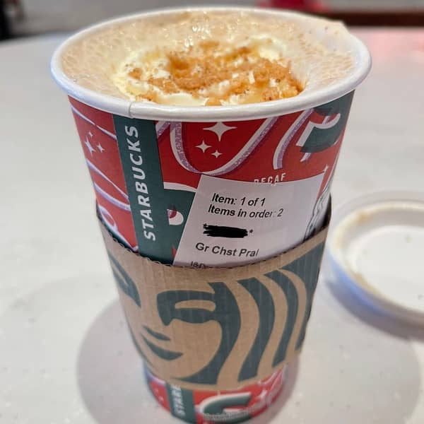  Chestnut Praline Latte in a branded Starbucks cup