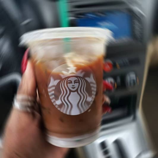 Closeup of woman holding "Liquid Cocaine" from the Starbuck secret menu 