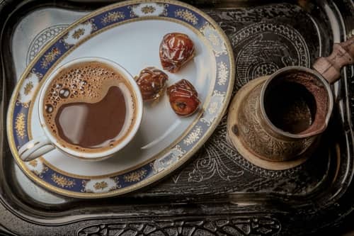  Turkish coffee pot and cup with dates.