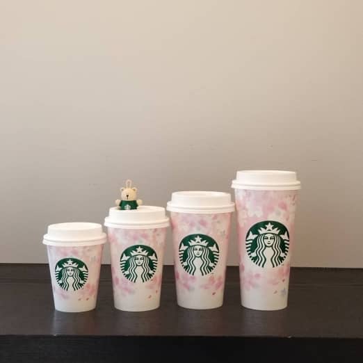 Starbucks coffee size cups in order: short, tall, grande, and venti.