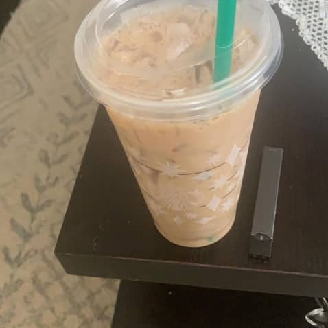 Starbucks iced coffee on a coffee shop table