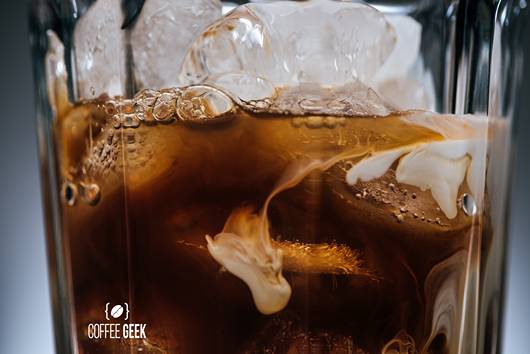 Close up view of cold brewed coffee with ice cubes