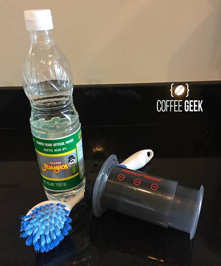 You can use a vinegar solution to clean the components of an AeroPress