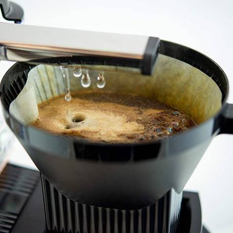 Hot water flowing into the brew basket of a Moccamaster