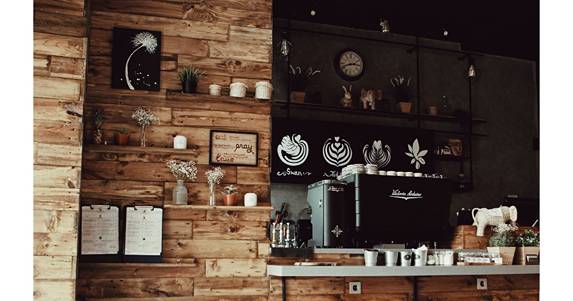 a coffee shop is an establishment that emphasizes the drink menu, particularly coffee beverages