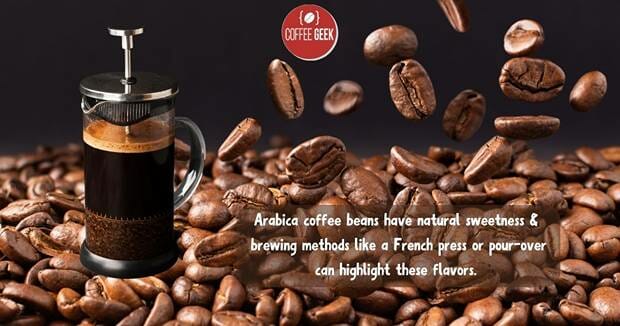 A french press coffee maker with coffee beans surrounding it.