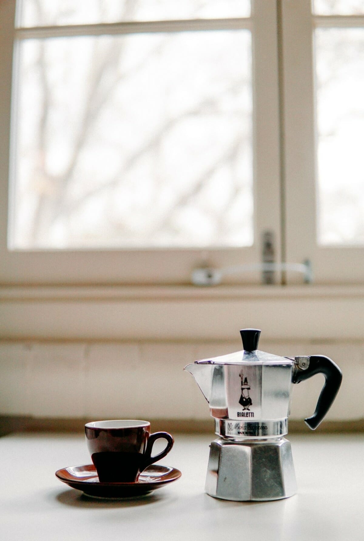 moka pot and espresso cup
